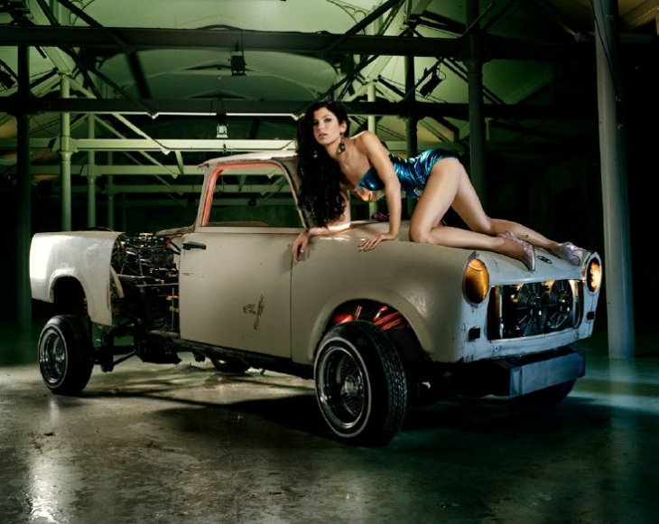 photograph of a woman on a car hood by liz cohen