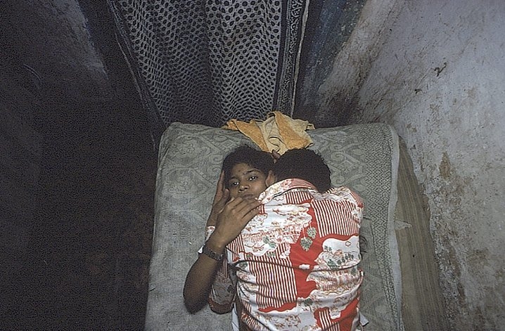 Munni with a Customer, Bombay, India (from Falkland Road Series), 1978, Cibachrome