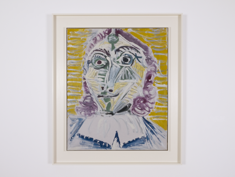 Installation view of Picasso, Mousquetaire. Buste, 1967. It shows a portrait of a Muskeeter depicted with long purple. he face is composed with many white stripes and yellow, green, purple areas. the background is yellow mustard with white and grey horizontal stripe which makes the image very dynamic.
