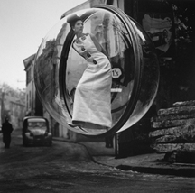 Melvin Sokolsky, Delvaux Street, Paris, 1963