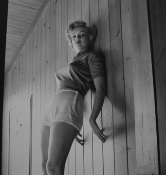 Murray Garrett, Marilyn Monroe (leaning on wall)