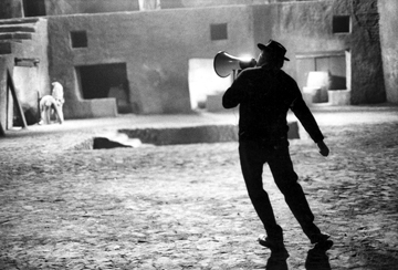 Mary Ellen Mark, Federico Fellini surveys a set for the following day, Fellini's Satyricon, Rome, Italy 1969