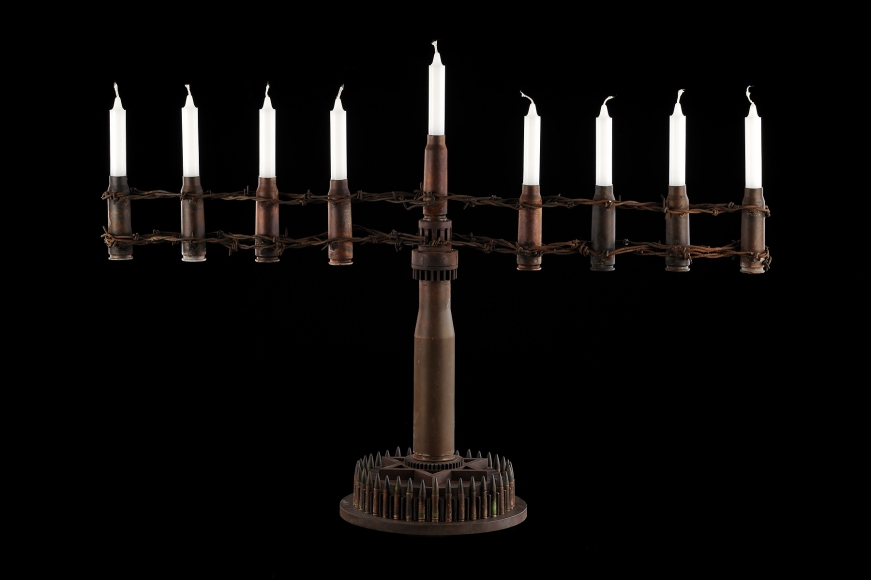 Al Farrow, Menorah (Fence II), 2011, shell casings, barbed wire, steel, 23 x 32 x 10 inches