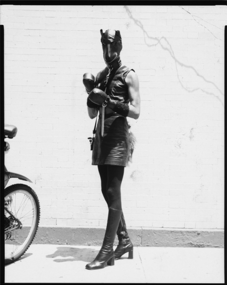 Woman dressed as dog by Benjamin Fredrickson