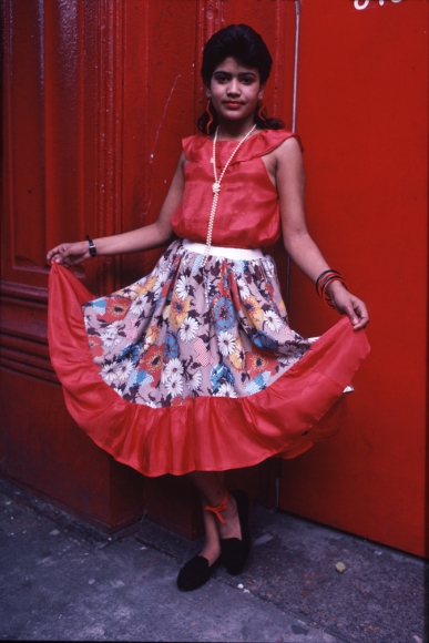 Woman in red dress by Arlene Gottfried