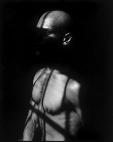 Man in shadow by Benjamin Fredrickson