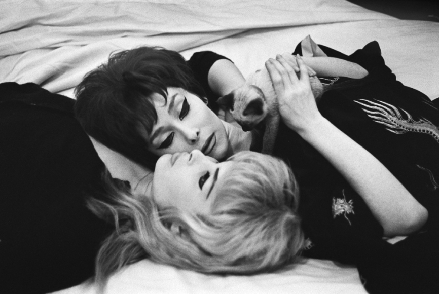 Two women on bed by Christer Stromholm