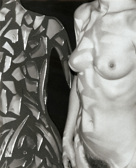 Woman with shards of mirror by Marcel Marien