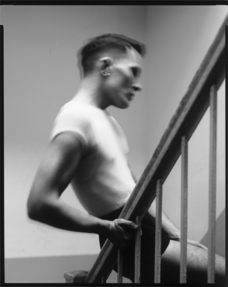 Man on stairs by Benjamin Fredrickson