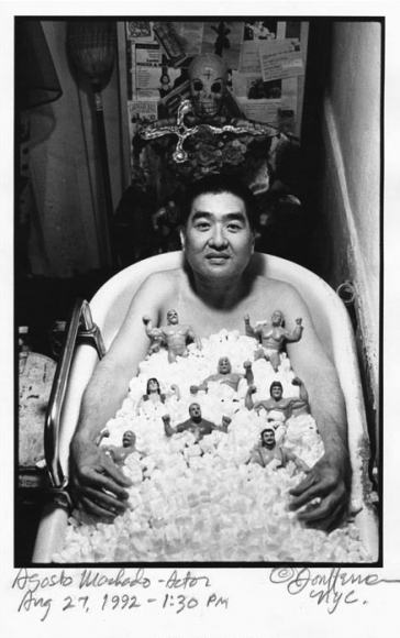 Agosto Machado in bathtub by Don Herron