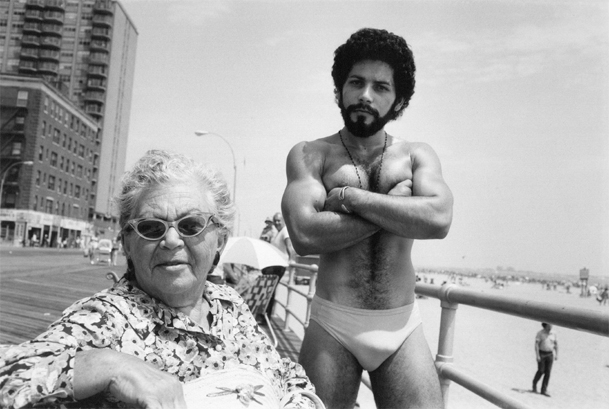 Man and woman on boarkwalk by Arlene Gottfried