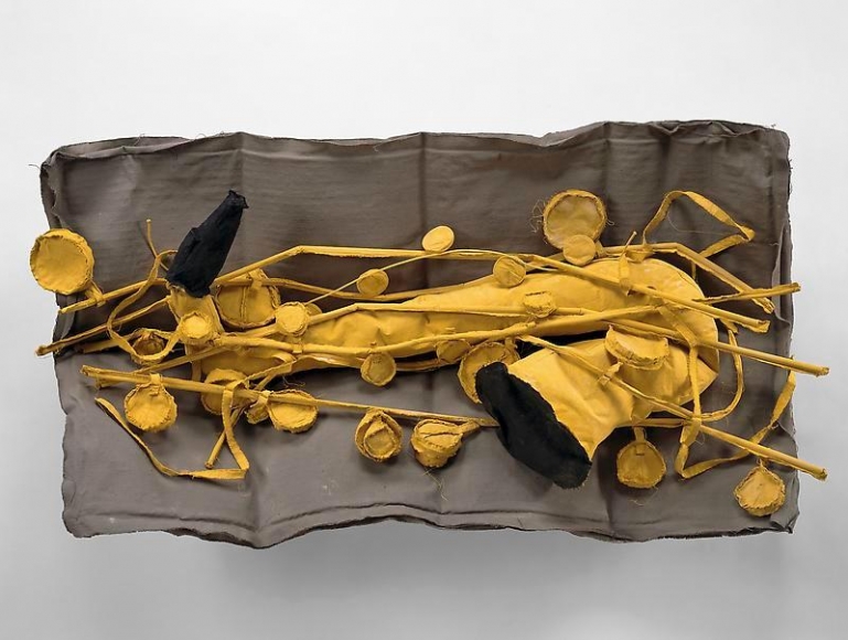 Claes Oldenburg and Coosje van Bruggen. Soft Saxophone, Scale A, Muslin, 1992. 63.5 x 116.8 x 25.4 cm. © 1992 Claes Oldenburg and Coosje van Bruggen. Photo courtesy Pace Gallery.