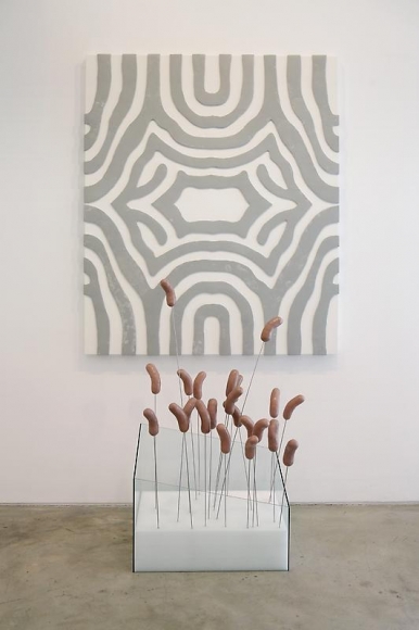 Michael Joo. Axis (Africanized Wurst), 2008. Hand-built plastic on canvas with cast epoxy and enamel paint, ethafoam, stainless steel, 232 x 124 x 67 cm. Courtesy of the artist & PKM Gallery.