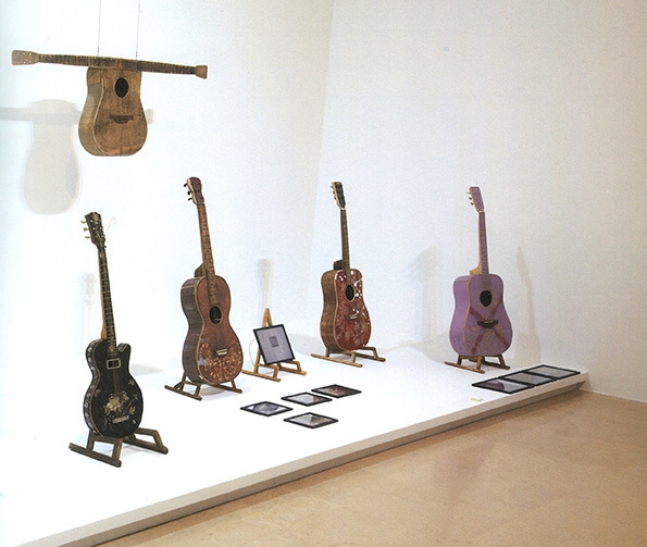 Bae Young-whan. The Way of Man-Array, 2005. Guitars buil with abandoned wood, Size variable. Installation view of solo exhibition "Song for Nobody," at PLATEAU, 2012.
