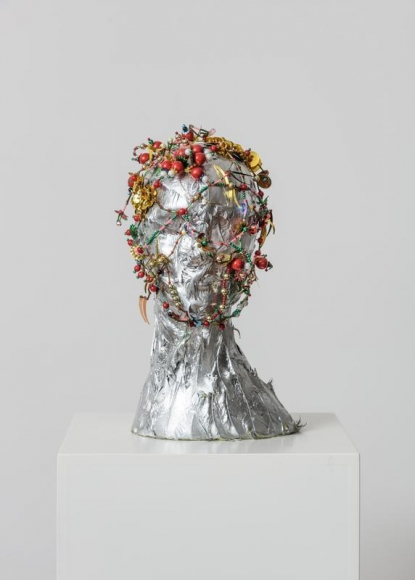 Lee Bul. Mask for a Warrior Princess, 1996. Sequins, beads, wires, feathers, chrome paint, mannequin head, 40 x 25 x 25 cm. Courtesy of the artist & PKM Gallery.