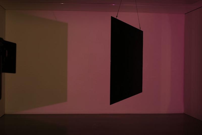 Olafur Eliasson. Your sliding shadow walls, 2009. 2 spotlights, colour filter, tripods, mirror, hardware, Size variable. Courtesy of the artist & PKM Trinity Gallery. © 2009 Olafur Eliasson.