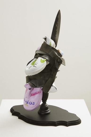 Cody Choi, Gift Exchange 2, 2009. Made in USA Tire Rubber, Korean cast iron, rope, childern shoes, marker pen, wood, 37 x 22.5 x 52 cm. Courtesy of the artist & PKM Gallery.