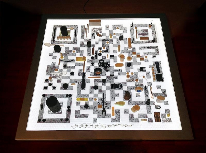 Donghee Koo. Shelter, 2012. LED panel, digital print on OHP film, black and white objects, 90 x 90 x 4 cm.