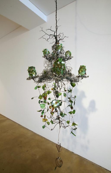 Bae Young-whan. Root in A Minor, 2008. Shards of wine bottles, various liquor bottles, iron, LED lights, epoxy, h 130 x dia 57 cm. Courtesy of the artist & PKM Gallery.
