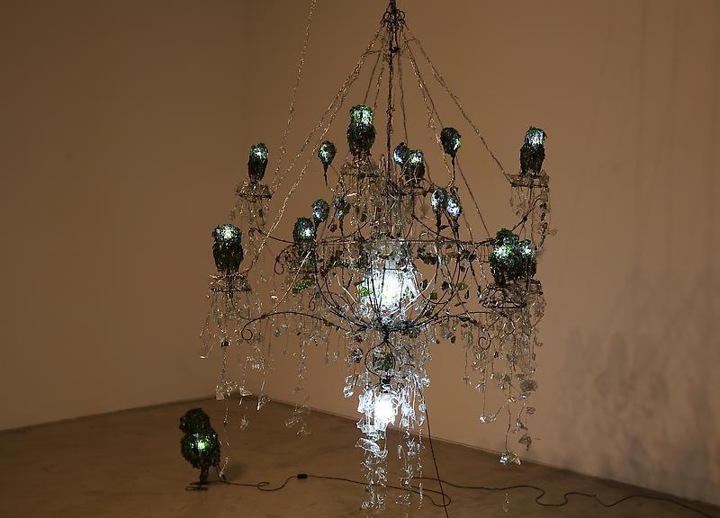 Bae Young-whan. Luxurious and Miserable Insomnia, 2008. Shards of wine bottles, various liquor bottles, iron, aluminium, LED lights, epoxy, h 223 x dia 150 cm.; Insomnia, 2008. Shards of wine bottles, various liquor bottles, iron, LED lights, epoxy, 46 x 25 x 30 cm. Courtesy of the artist & PKM Gallery.