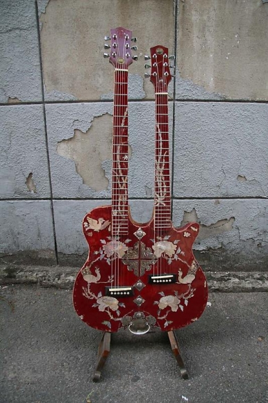 Bae Young-whan. The Way of Man - First Love 3, 2007. Double guitar built with abandoned sewing machine cabinet, mother-of-pearl inlay, 110 x 49 x 9 cm. 