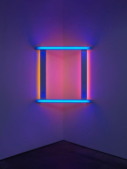 Dan Flavin. untitled, 1971, blue, yellow, and pink fluorescent light, 4 ft. (122 cm) square across a corner, Edition 1 of 5. Courtesy David Zwirner and PKM Gallery.