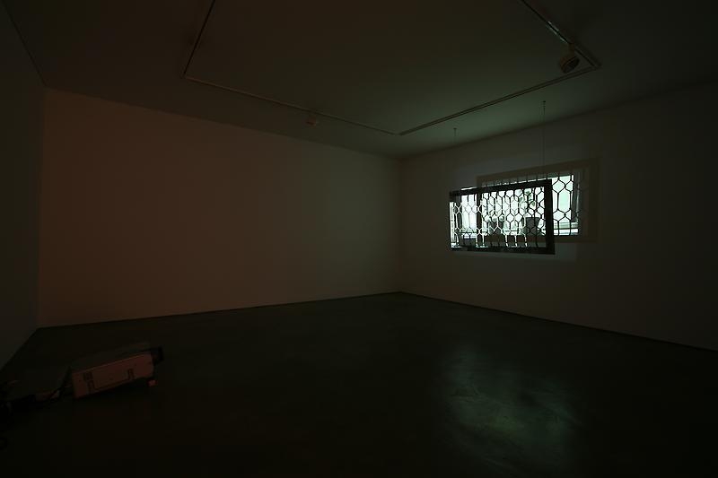 Bae Young-whan, Time in Heart, 2008. Video projection, window frame, Installation size variable, frame size: 70 x 115.5 cm. Courtesy of the artist & PKM Gallery.