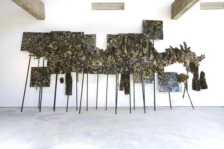 Qiu Zhijie. Storm is Coming, 2008. Oil on canvas, wood, bamboo, strings, 8m (dragon), 90 x 90cm (set of 20). Courtesy of the artist & PKM Gallery.