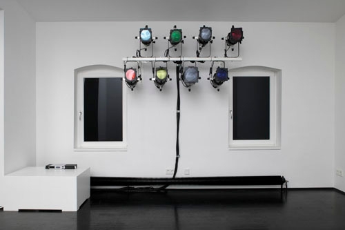 Olafur Eliasson. Afterimage star, 2008. Eight spotlight, wall mount, color filter foil(blue, yellow, magenta, red, green, turquoise), control unit, Duration: 4:43 min. Courtesy of the artist & PKM Trinity Gallery. © 2012 Olafur Eliasson.