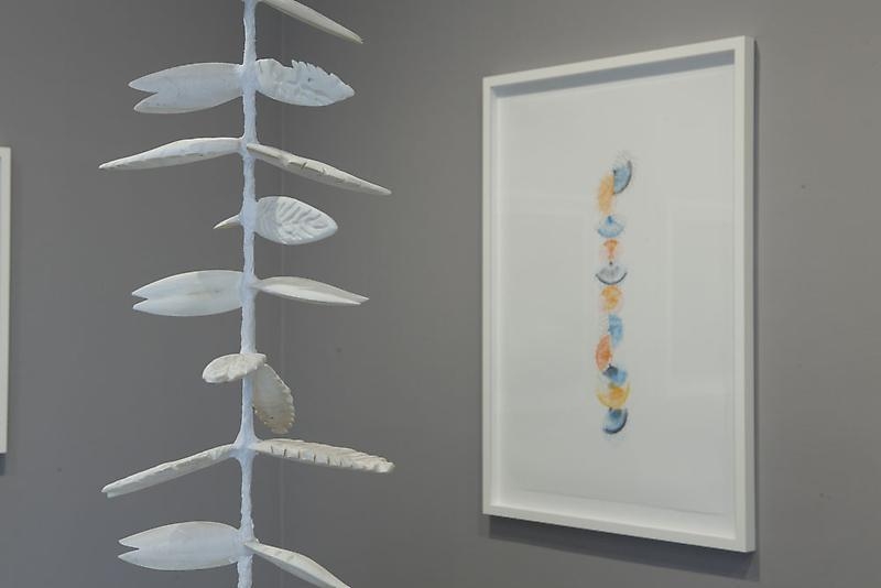 Minouk Lim. Yongbong-ri, 2011. Cuttlefish bones, metal, plaster, gauze, plastic fan, paraffin, 194 x 35 cm diameter; Espionage Ship, 2011. Pastel on paper, 137 x 97 x 4.5 cm (including frame). Courtesy of the artist & PKM Gallery.