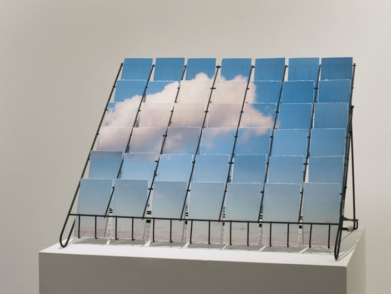 Postcloud, 2012, Pigment print in a wire postcard rack. 8 x 24 x 12 inches