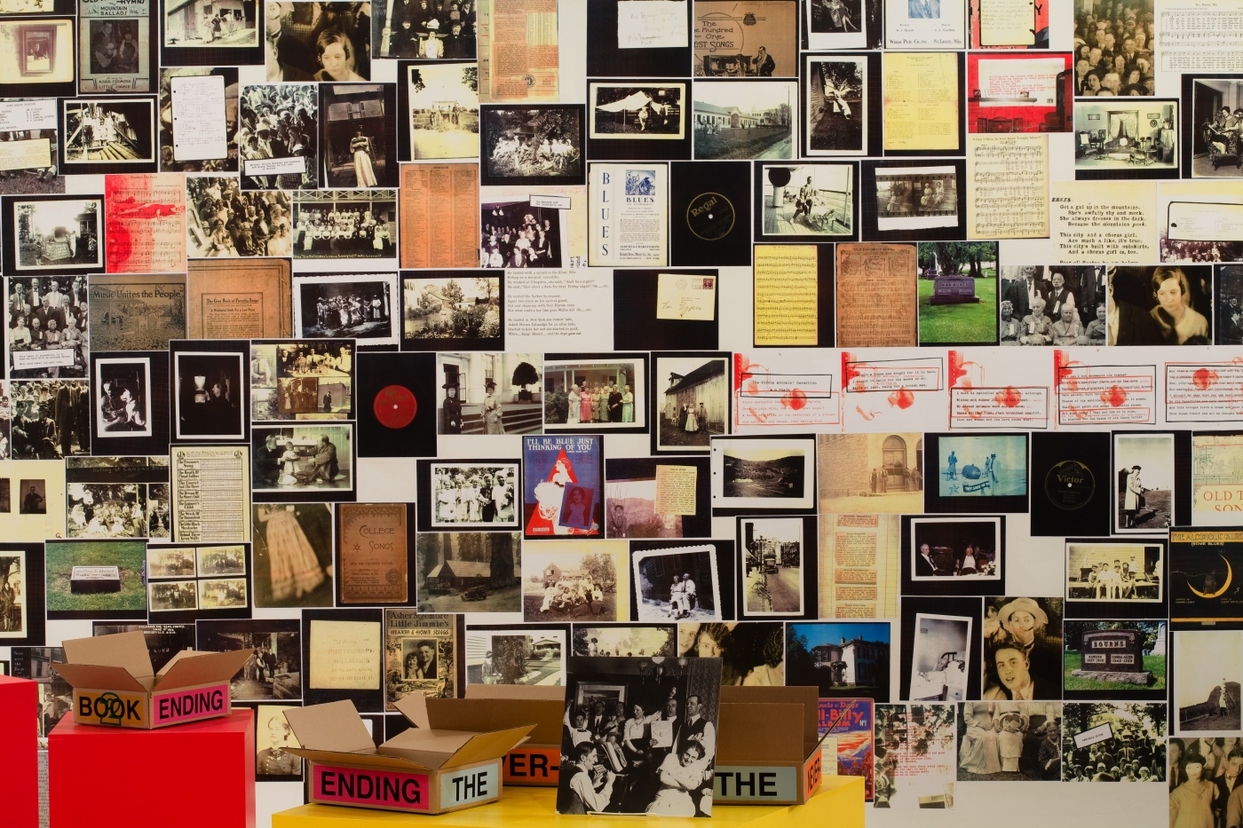 Allen Ruppersberg The Never Ending Book Part Two/Art and Therefore Ourselves 2009 color copies, cardboard boxes, artist's records 5 lightboxes banner letterpress posters and 17 furniture elements overall dimensions variable