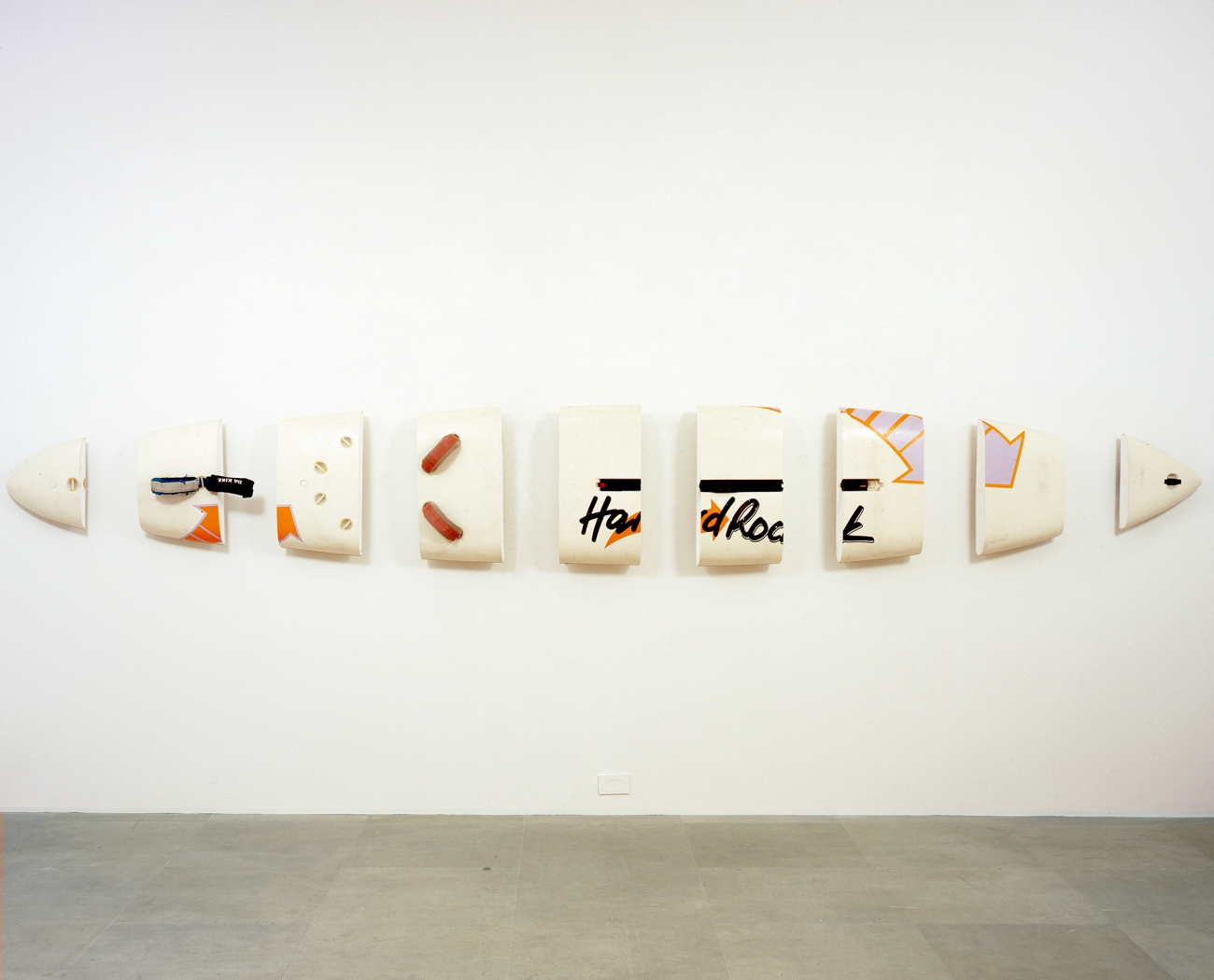 Michael Krebber, Hard Rock, 2008, Windsurfing board, wall mounts, 24 1/2 x 183 inches