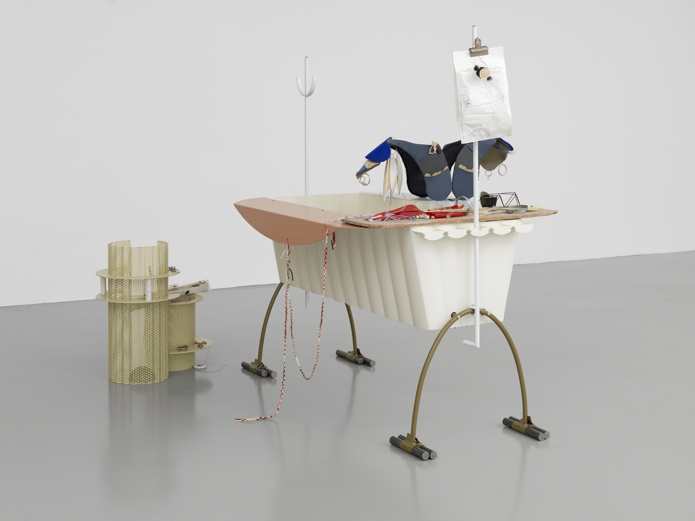 Helen Marten Bodybowl, 2014 Welded steel, aluminium, fabric, plastic, cuttlefish, braided wool, cast bronze, cast rubber, fossil teeth, corn stalk, cast resin, marbles, chipboard, electrical wire, stainless steel, toothpicks 67 x 70 7⁄8 x 45 1⁄4 in (170.18 x 180.02 x 114.94 cm)