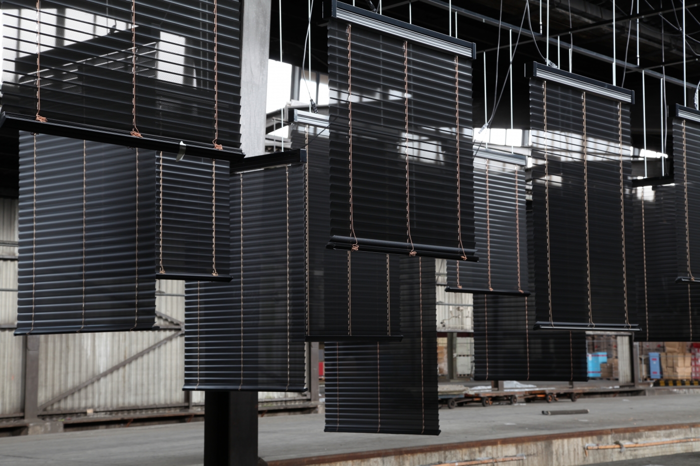 Haegue Yang Approaching: Choreography Engineered in Never-Past Tense, 2012 Installation with motorized aluminum venetian blinds, aluminum hanging structure Dimensions variable Installation view, dOCUMENTA (13), Kassel, 2012