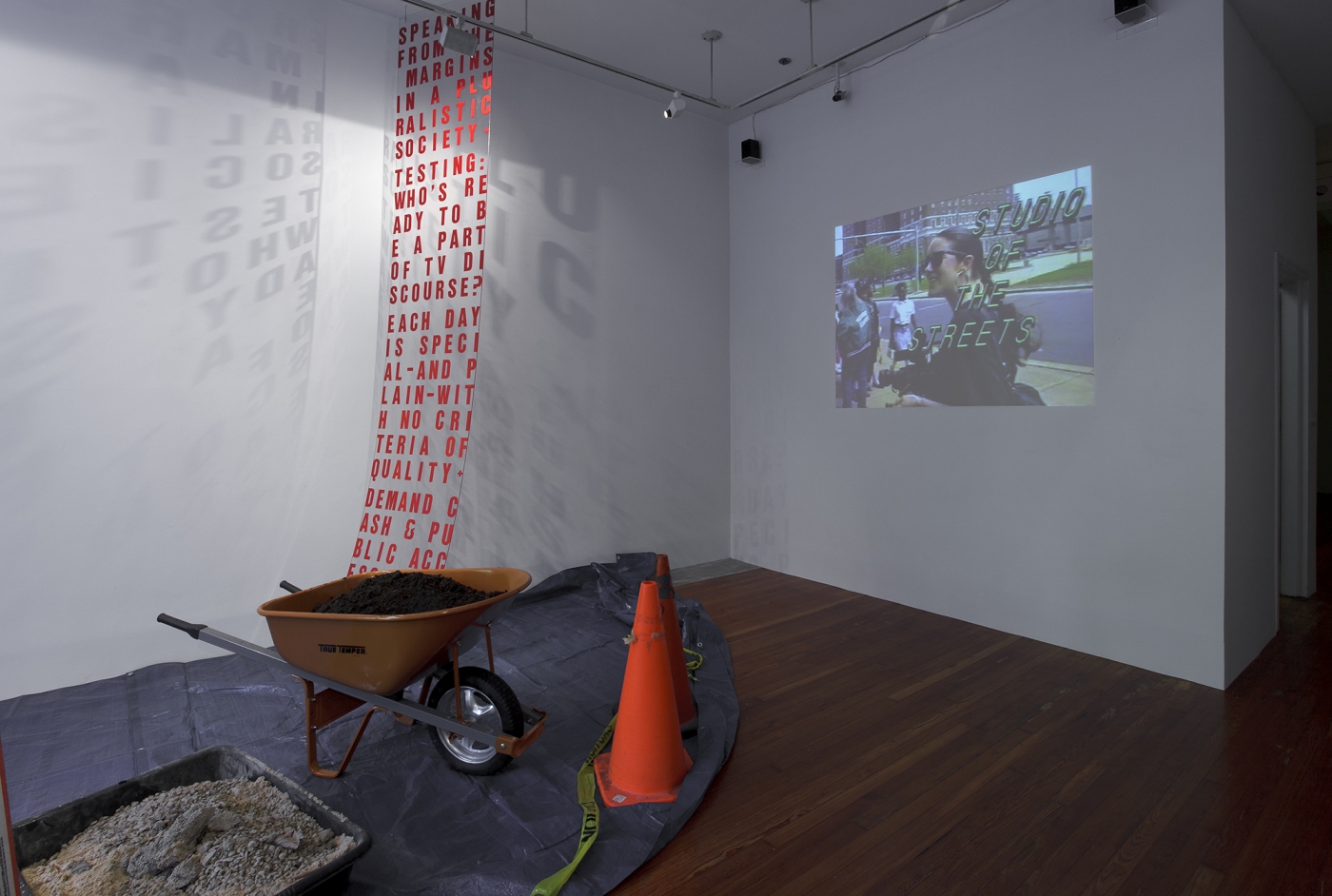 Tony Conrad Studio of the Streets, 1990-1993 Four-channel video and acrylic panel with vinyl lettering Panel: 144 x 26 inches 365.8 x 66 cm