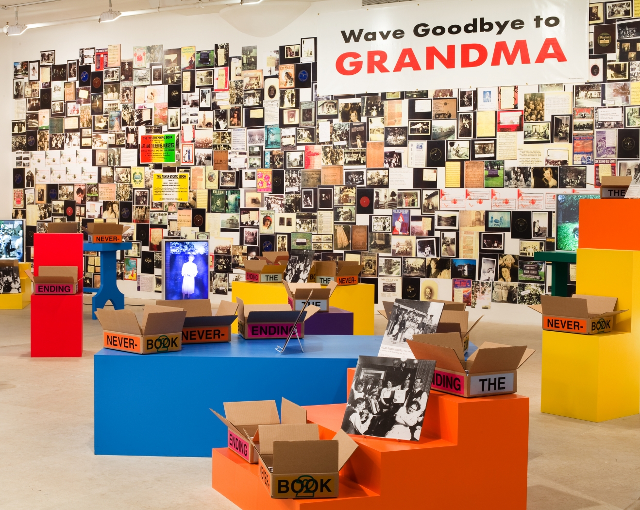 Allen Ruppersberg The Never Ending Book Part Two/Art and Therefore Ourselves 2009 color copies, cardboard boxes, artist's records 5 lightboxes banner letterpress posters and 17 furniture elements overall dimensions variable