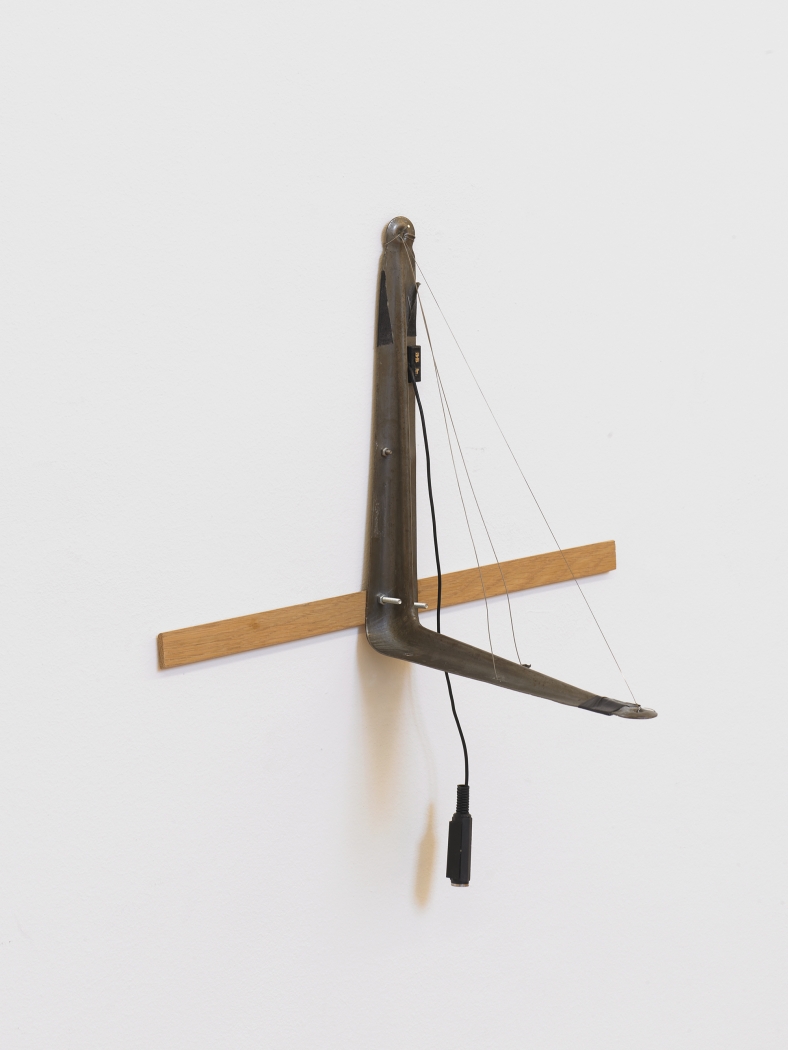 Tony Conrad L-bracket with Three Strings, 2002 Bowed wire (hand stretched), L-bracket, electric pickup 13. 3/4 x 15 3/4 x 10 1/4 inches 35 x 40 x 26 cm