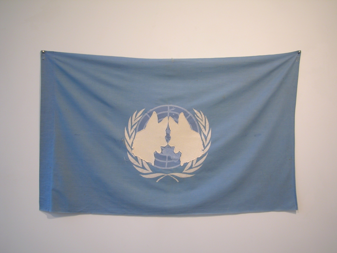 Christoper Lucas, cosmosabbat, 2002, felt sewn on cloth, 36 inches x 60 inches