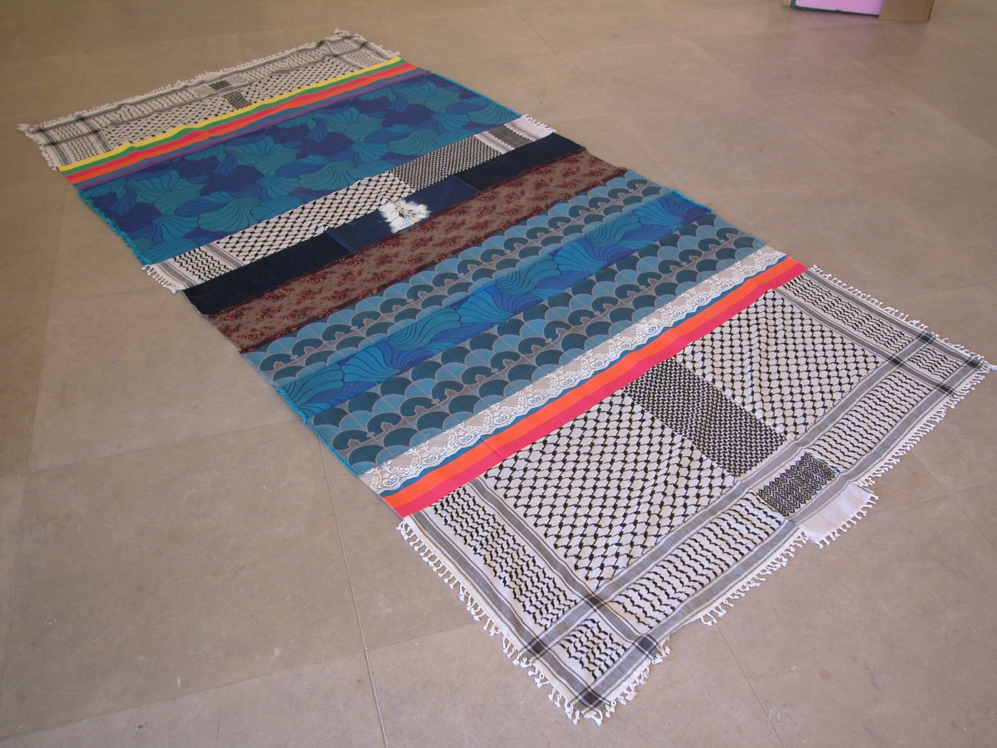 Josephine Meckseper, Orient Occident (Rug #2), 2004, mixed fabrics, 56 x 112 inches