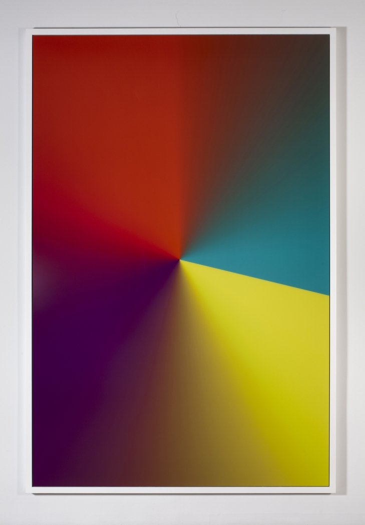 A mounted print of a photoshop gradient of yellow, violet, red, and teal hues.