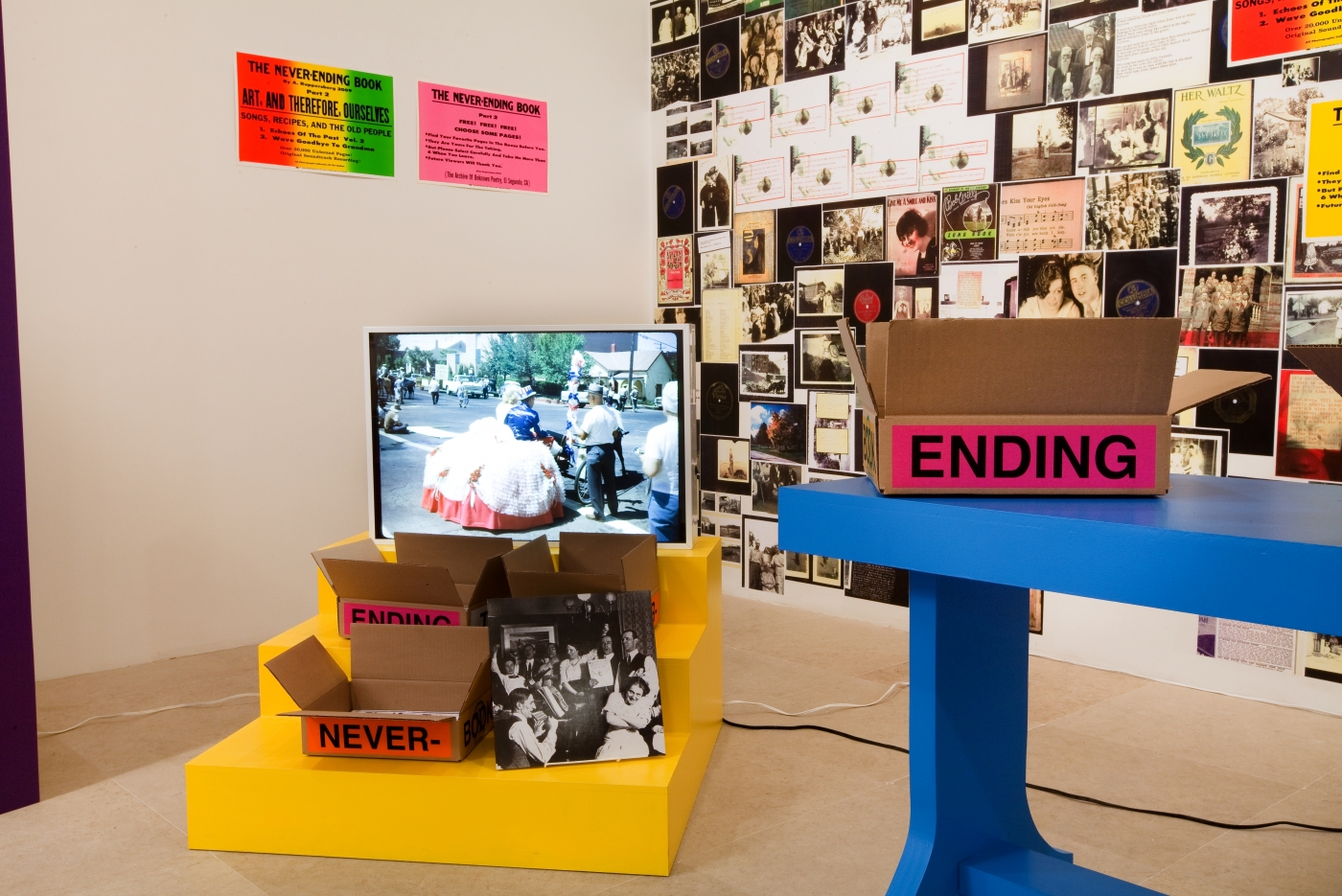Allen Ruppersberg The Never Ending Book Part Two/Art and Therefore Ourselves 2009 color copies, cardboard boxes, artist's records 5 lightboxes banner letterpress posters and 17 furniture elements overall dimensions variable