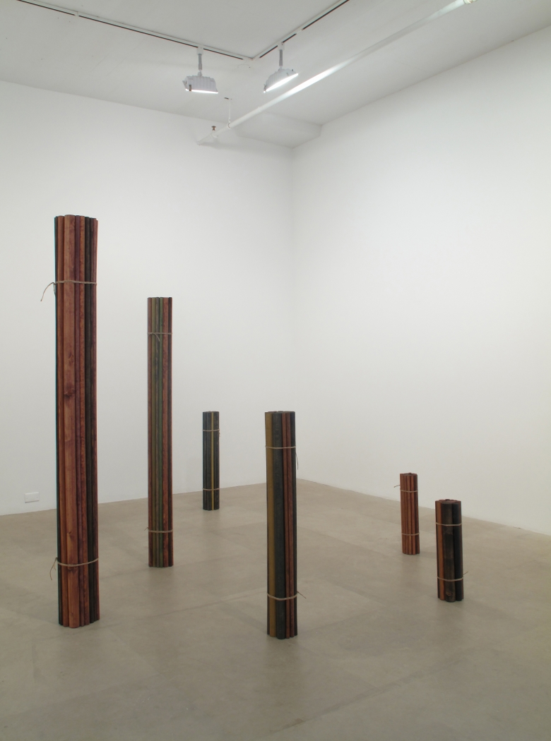 Bündel, 2009, wood, gouache, oil, twine, six parts, 74 7/8 x 107 x 37 inches (approx. overall)