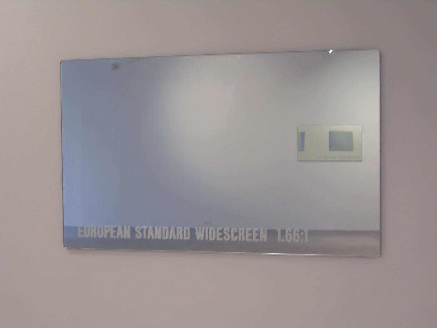 European Standard Widescreen 1.66:1, 2004, mirrored glass, 24 x 39 5/8 inches 61 x 100.6 cm
