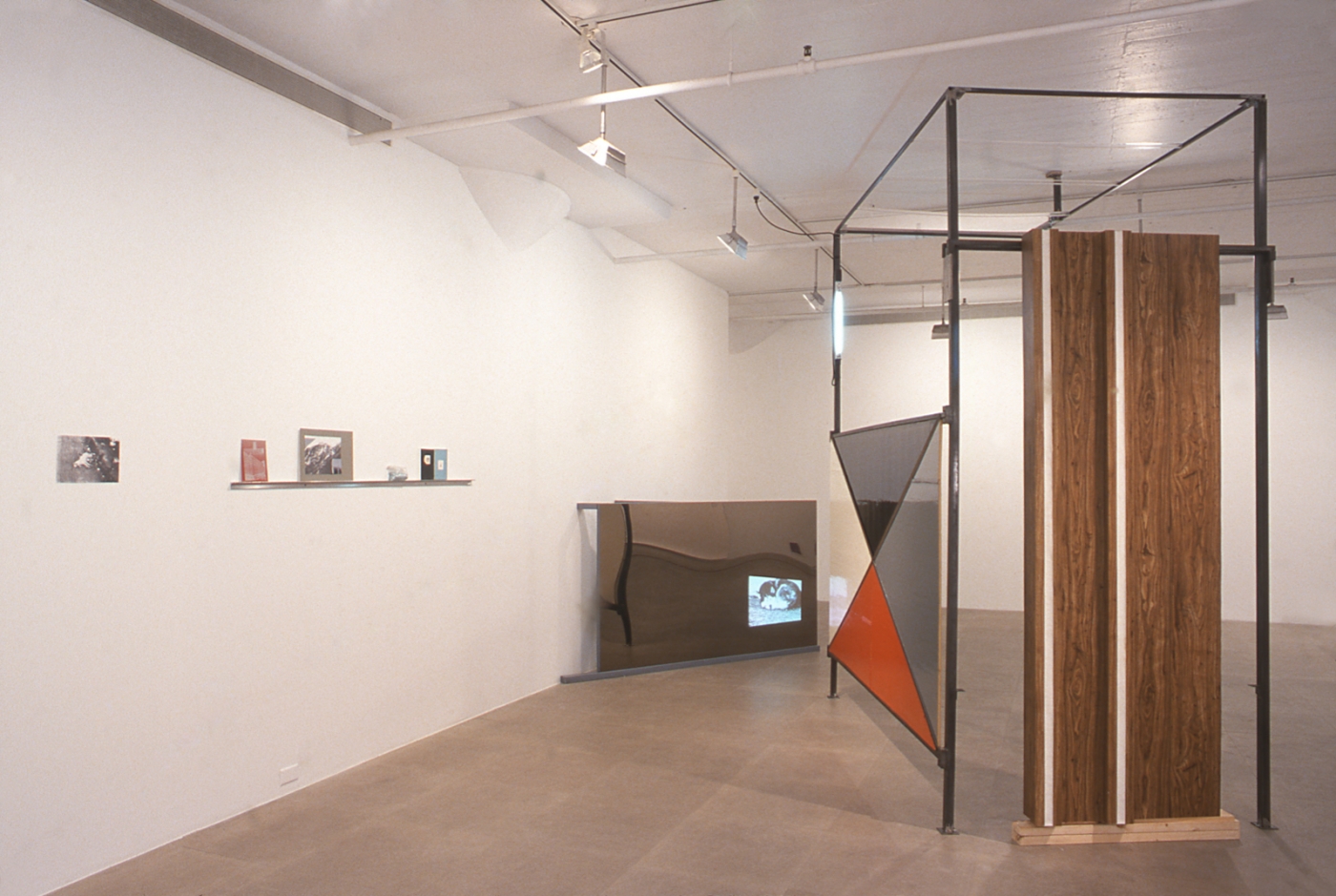 Heidie Gianotti, When Suburban Living Was Good, 2001 (detail), Steel, plexi, insulation, caulking, vinyl, super 8 film, Dimensions variable
