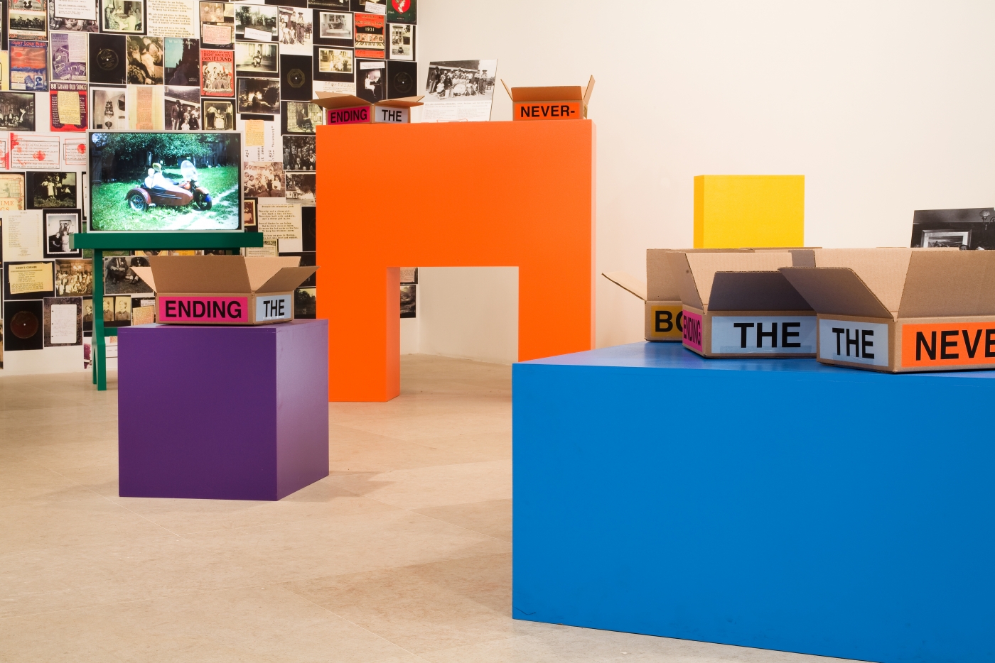 Allen Ruppersberg The Never Ending Book Part Two/Art and Therefore Ourselves 2009 color copies, cardboard boxes, artist's records 5 lightboxes banner letterpress posters and 17 furniture elements overall dimensions variable