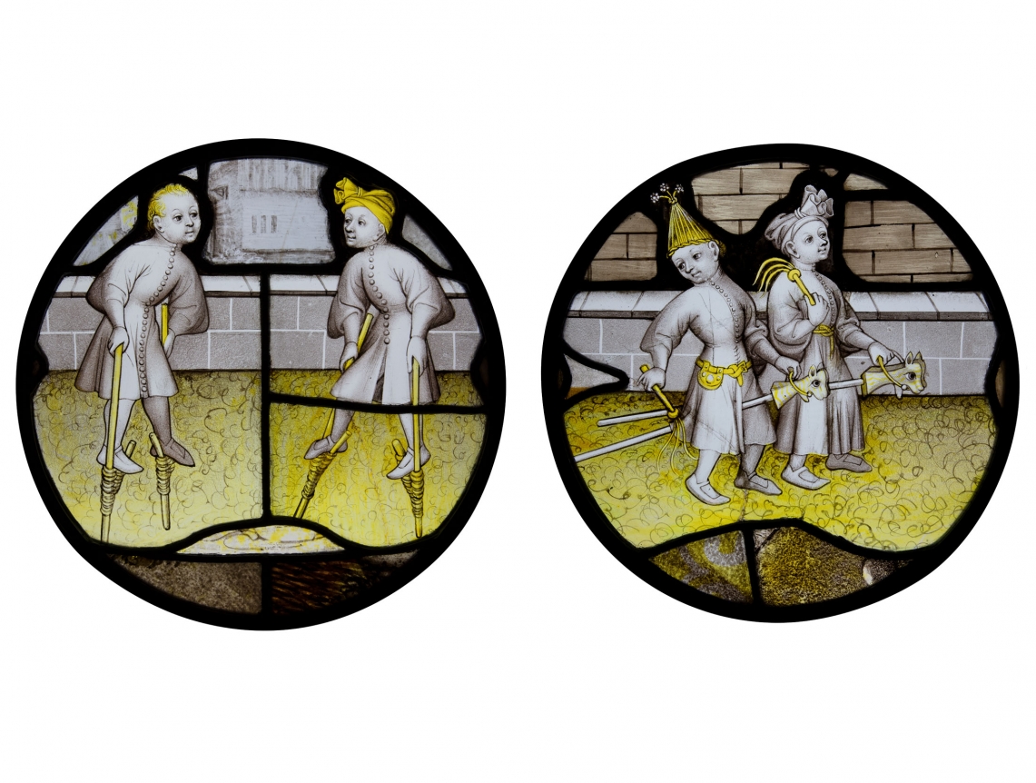 Two stained-glass roundels depicting children’s games, c. 1450