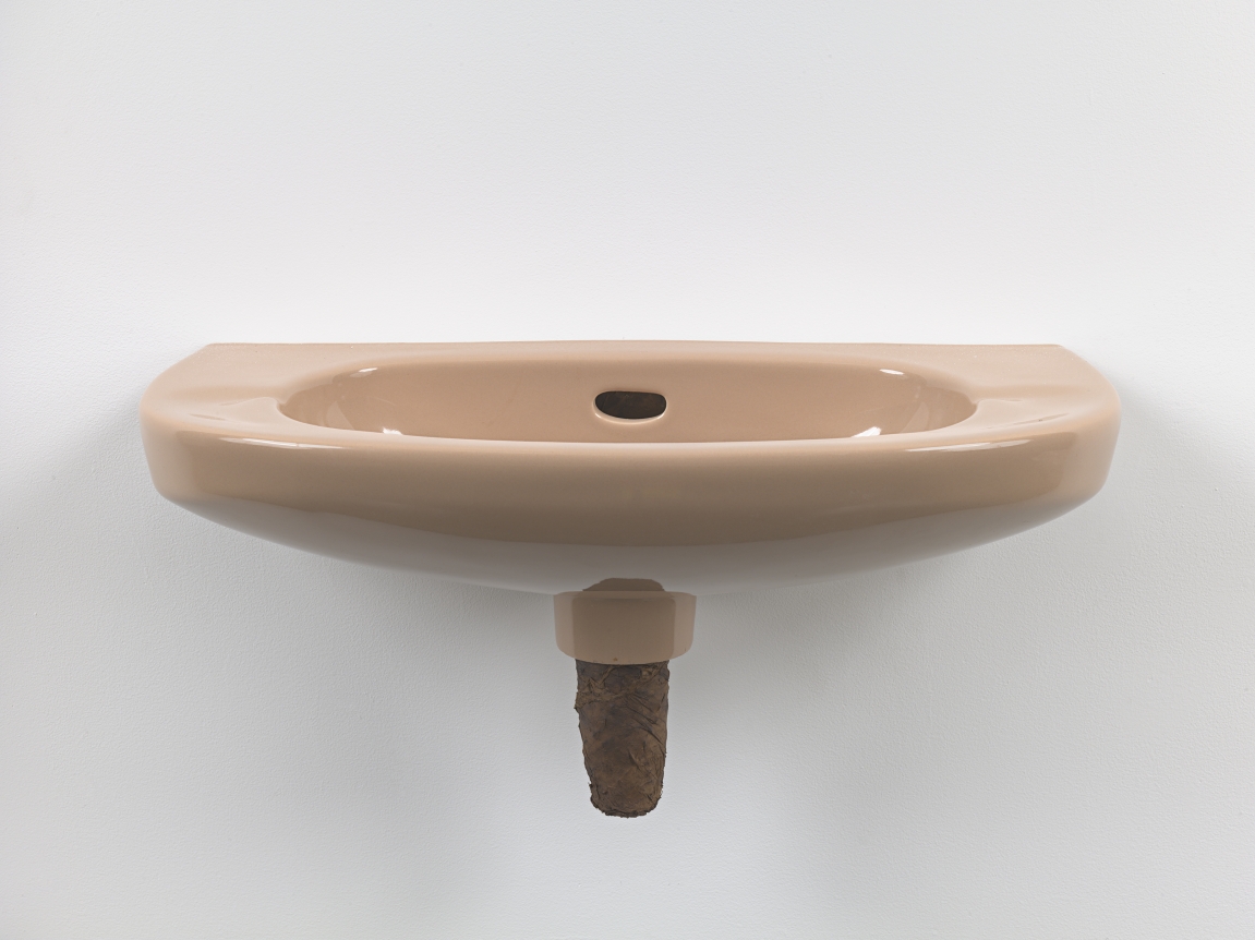 Plug, 2018. Ceramic sink, hand-rolled cigar,