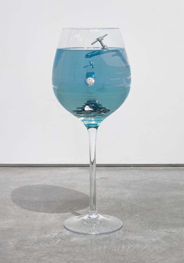 Plunge, 2015. Faucet, coins, resin, wine glass,