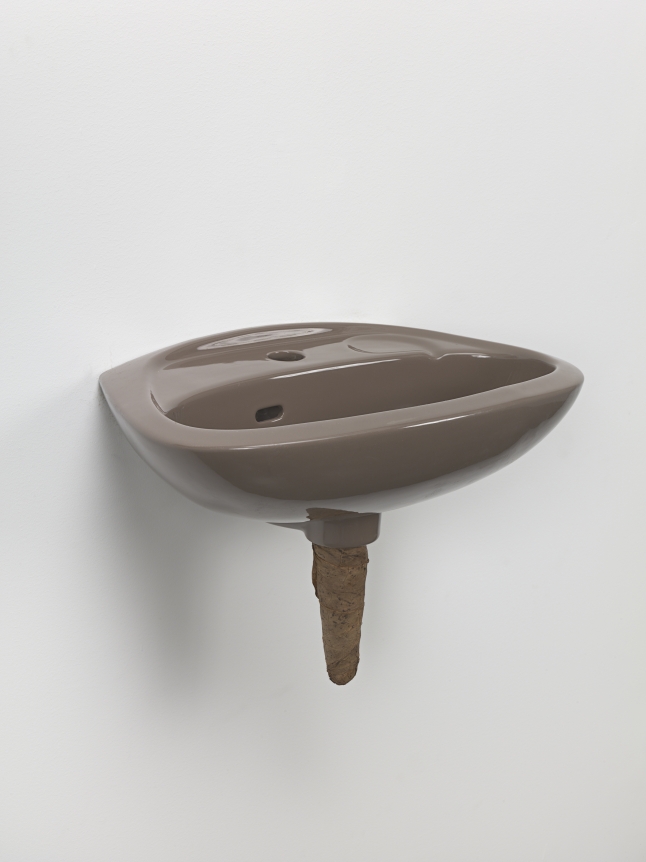 Plug, 2018. Ceramic sink, hand-rolled cigar,